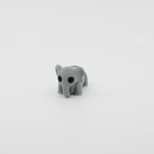 Front view of articulated mini elephant sensory fidget with 3D printed trunk and large ears