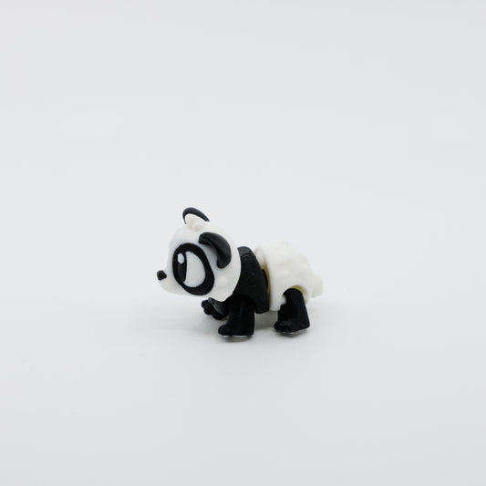 Side profile of articulated panda sensory fidget highlighting curved body segments and soft features
