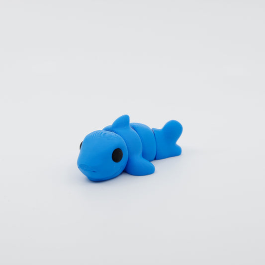 Front view of articulated mini shark sensory fidget showing detailed fins