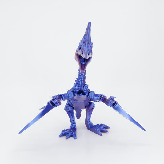 Flexi 3D printed dinosaur skeleton Pteranodon shown from the front. Highlights the long beak and articulated wing joints.