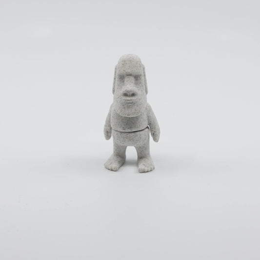 Front view of articulated mini Moai sensory fidget with detailed facial features and 3D printed design