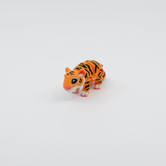 Front view of 3D printed mini tiger fidget with articulated joints