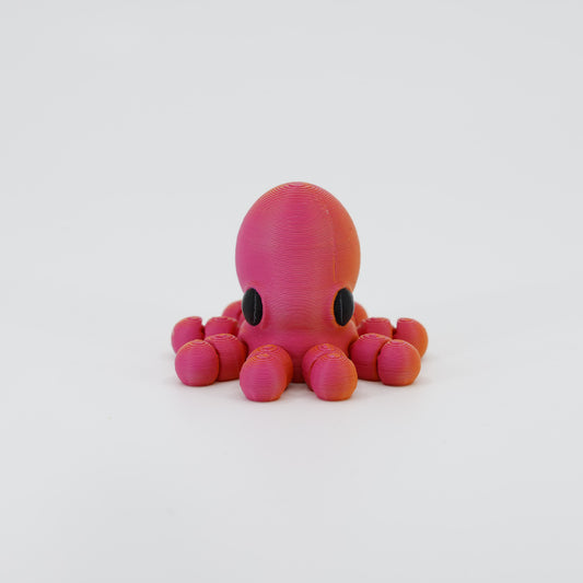 3D printed Octopus Wiggle Bud flexible toy shown from the front. Features the large head (mantle) and the array of articulated tentacles, perfect for a realistic ocean 3D print toy.