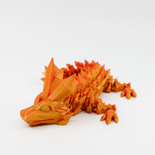 Front view of 3D printed baby crystal dragon showing detailed face and glittery crystal scales