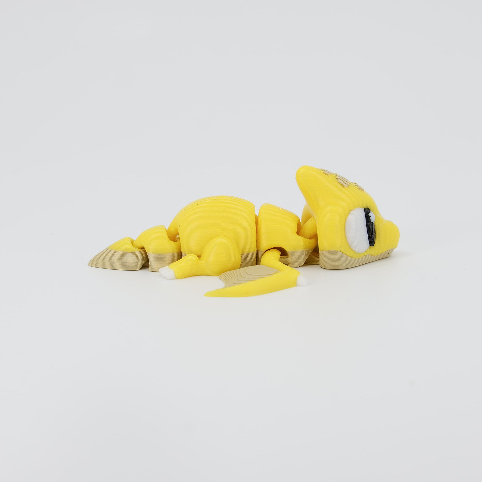 Side profile of the Australian made articulated Pterodactyl fidget, showing the head crest and flexi wing movement.