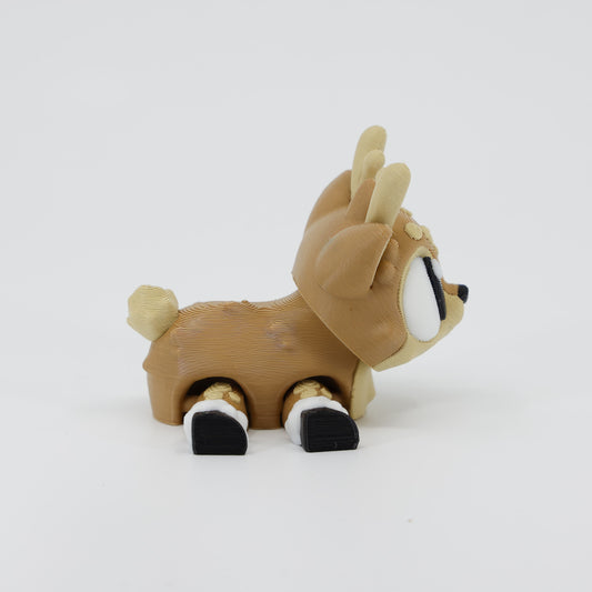 Side profile of the Australian made articulated reindeer fidget, showing the prancing posture and flexi body movement.