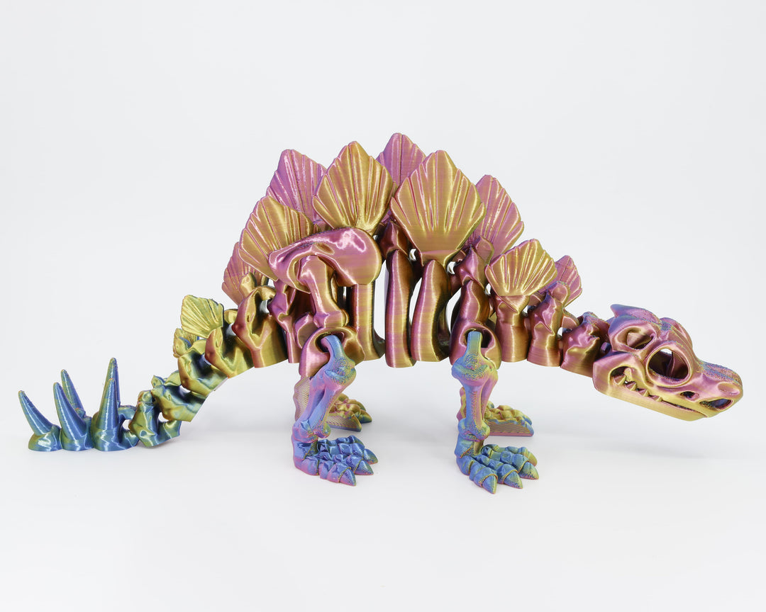 Side view of the Australian made articulated Stegosaurus skeleton, emphasizing the arched back plates and flexi spine.