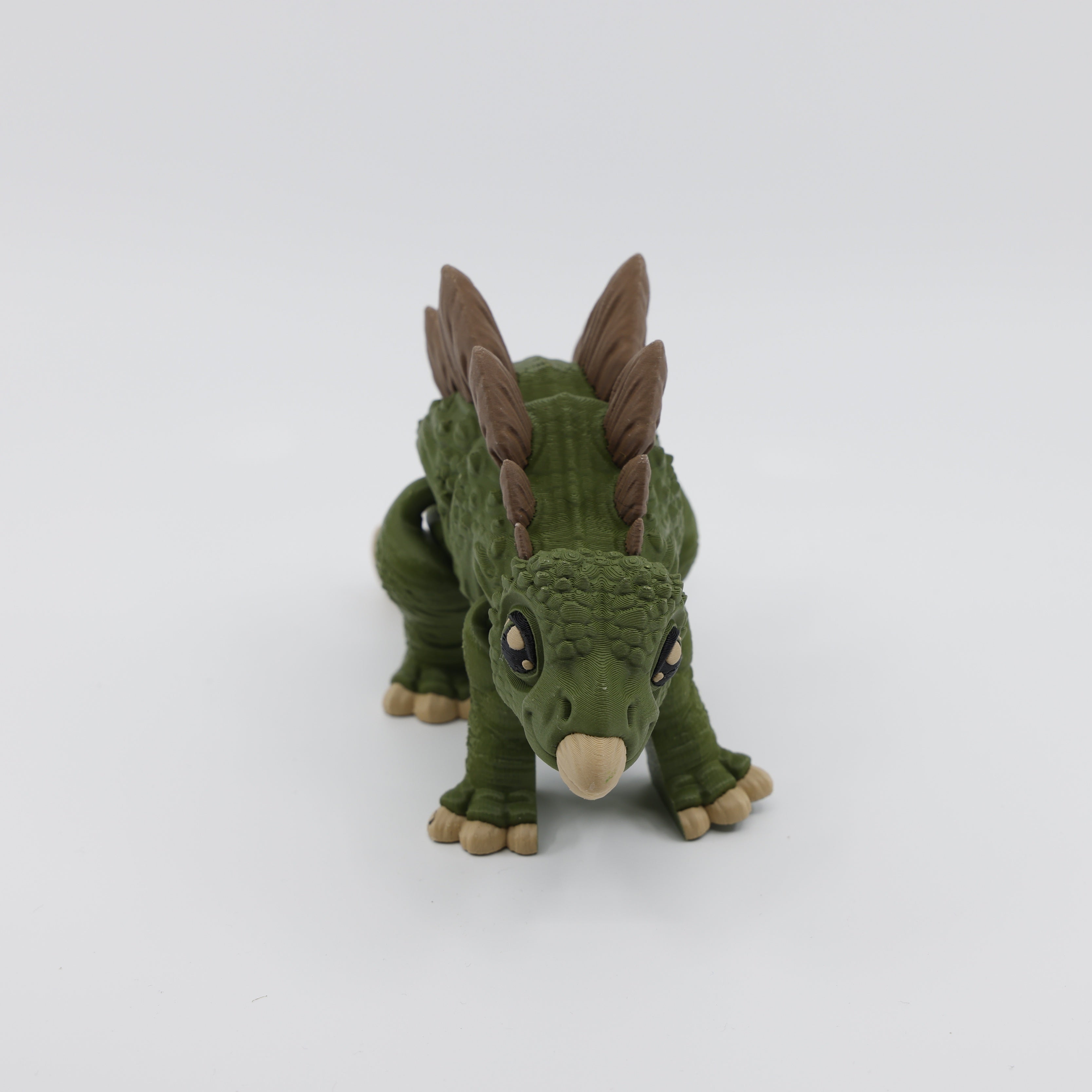 Front view of Stegosaurus fidget – 3D printed articulated sensory toy