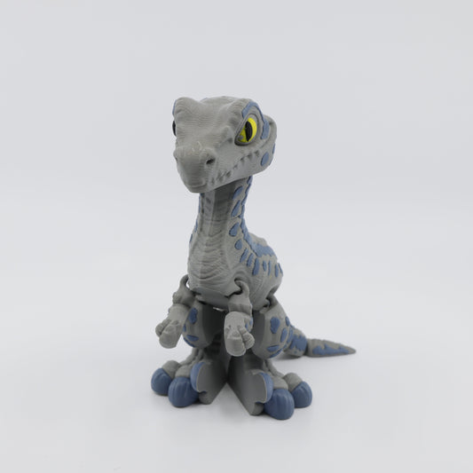 Front view of Velociraptor fidget with detailed articulated limbs – sensory toy