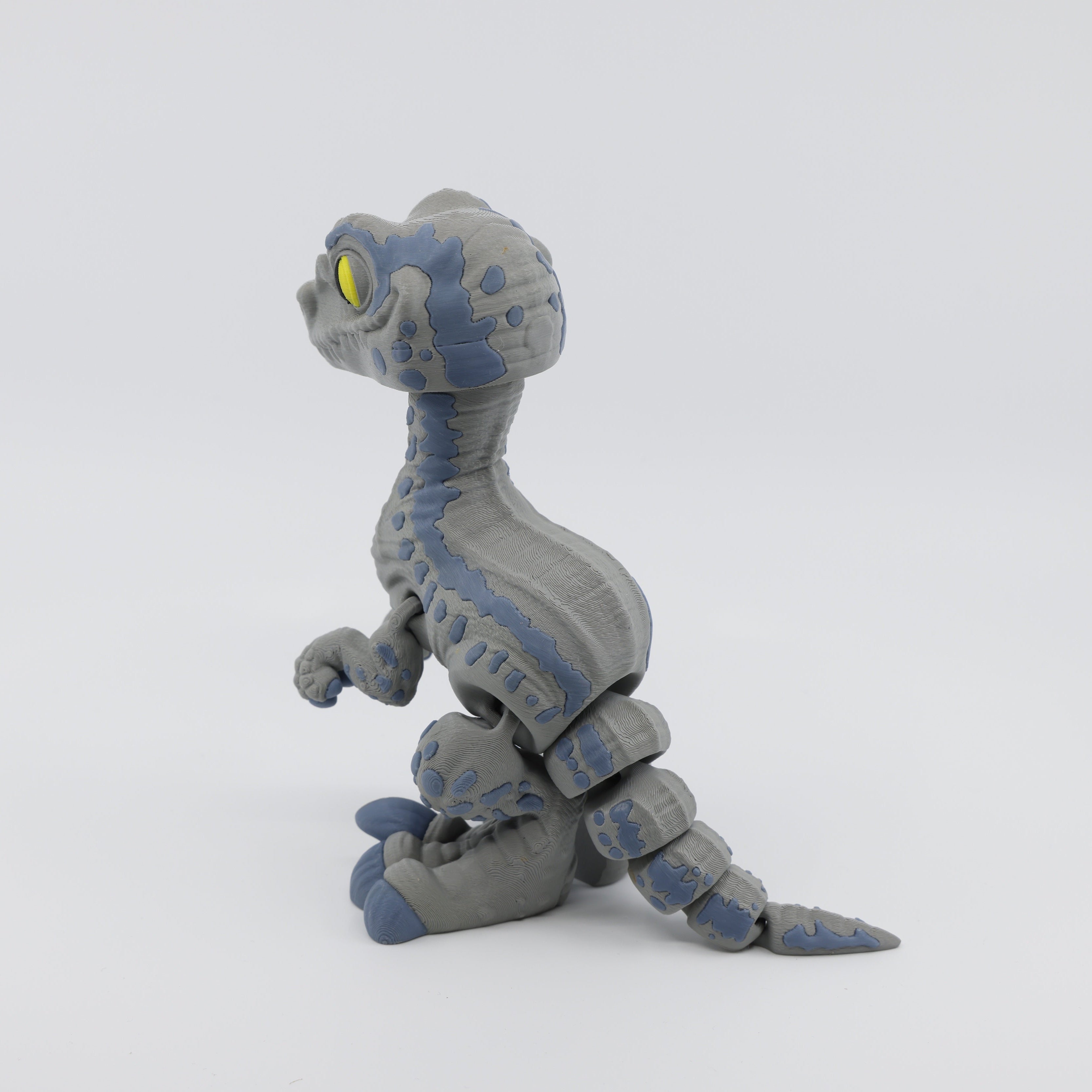 Velociraptor fidget facing left – 3D printed articulated sensory fidget