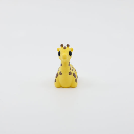 Front view of articulated mini giraffe sensory fidget with cute facial features and long neck