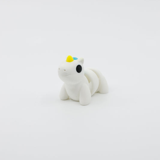 Front view of articulated mini unicorn sensory fidget with colorful mane and 3D printed details