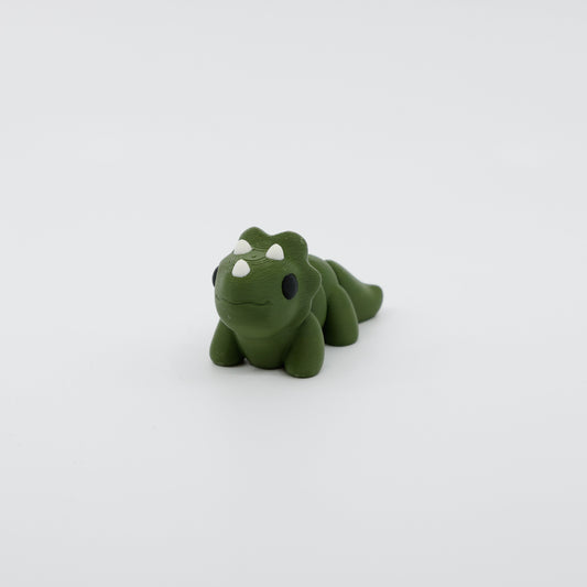 Front view of articulated mini triceratops sensory fidget with detailed horns and 3D printed features