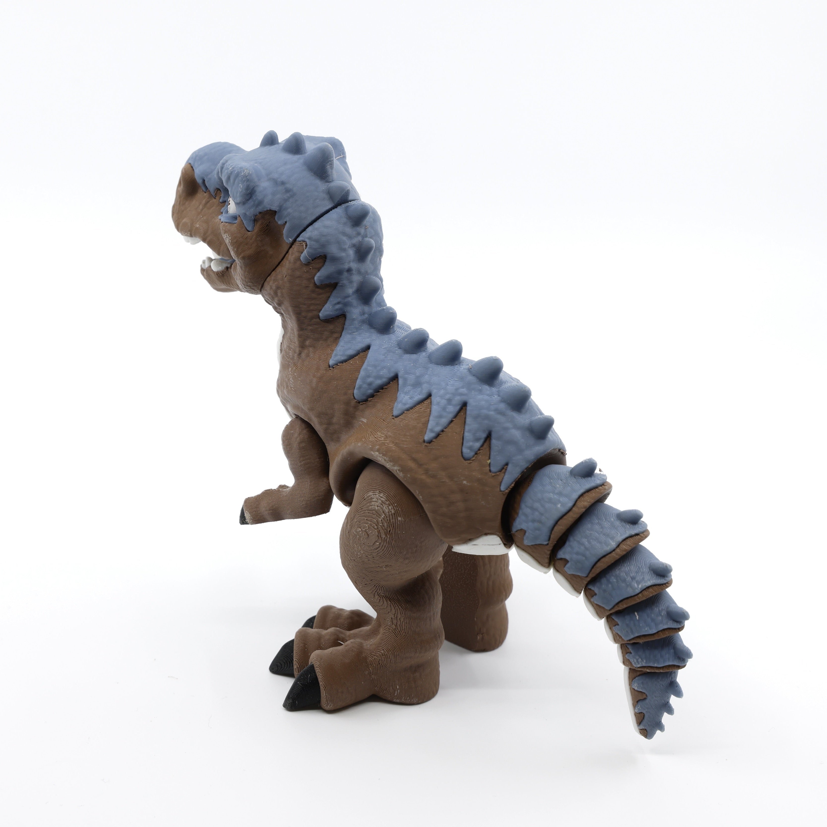 Side view of articulated T-Rex fidget – calming sensory fidget dinosaur