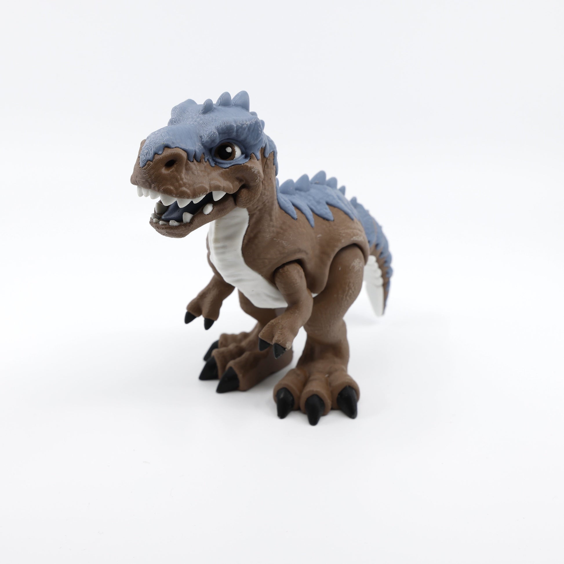 Front view of articulated T-Rex fidget with mouth open – sensory fidget dinosaur