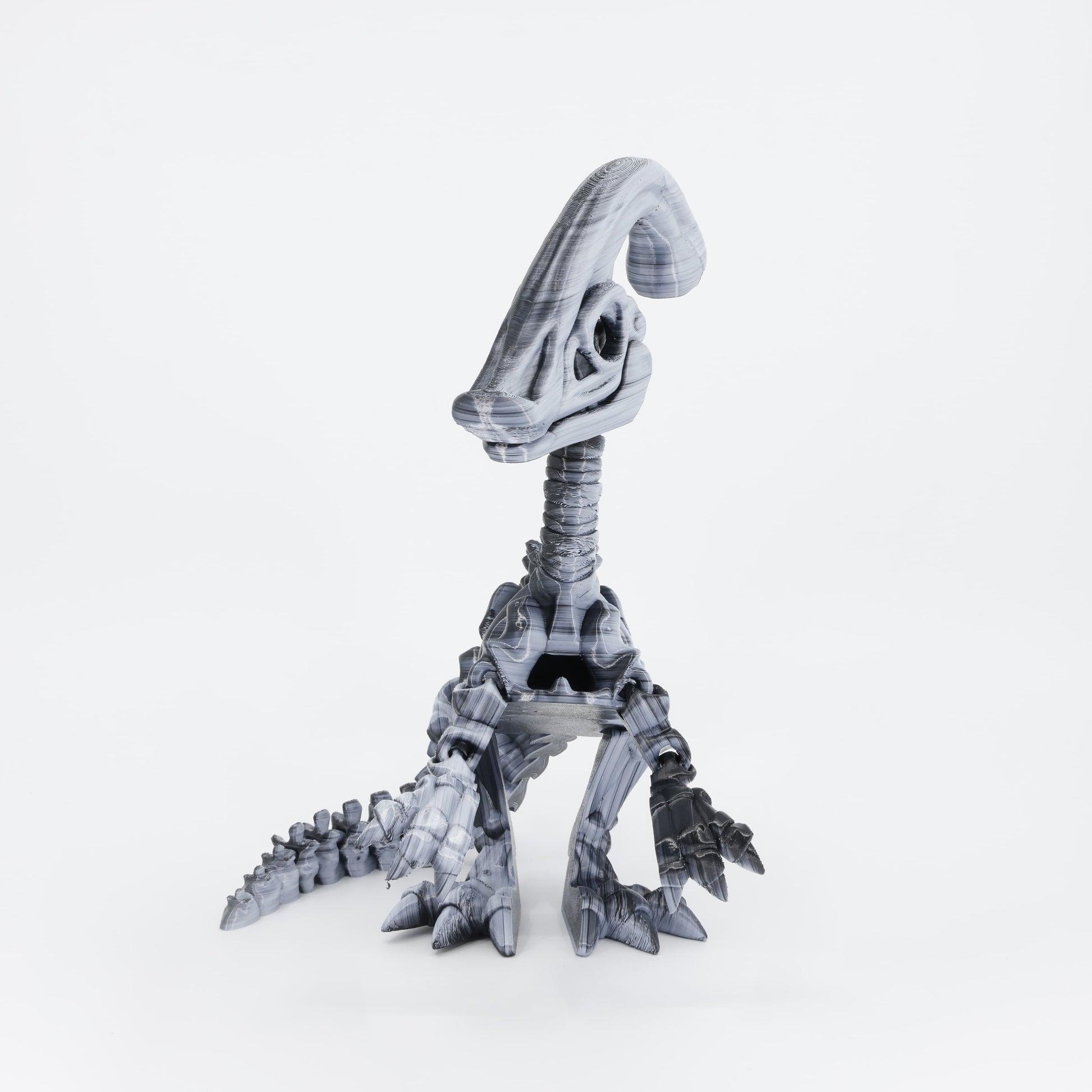 Flexi 3D printed dinosaur skeleton Parasaurolophus shown from the front. Highlights the iconic head crest and articulated rib cage.