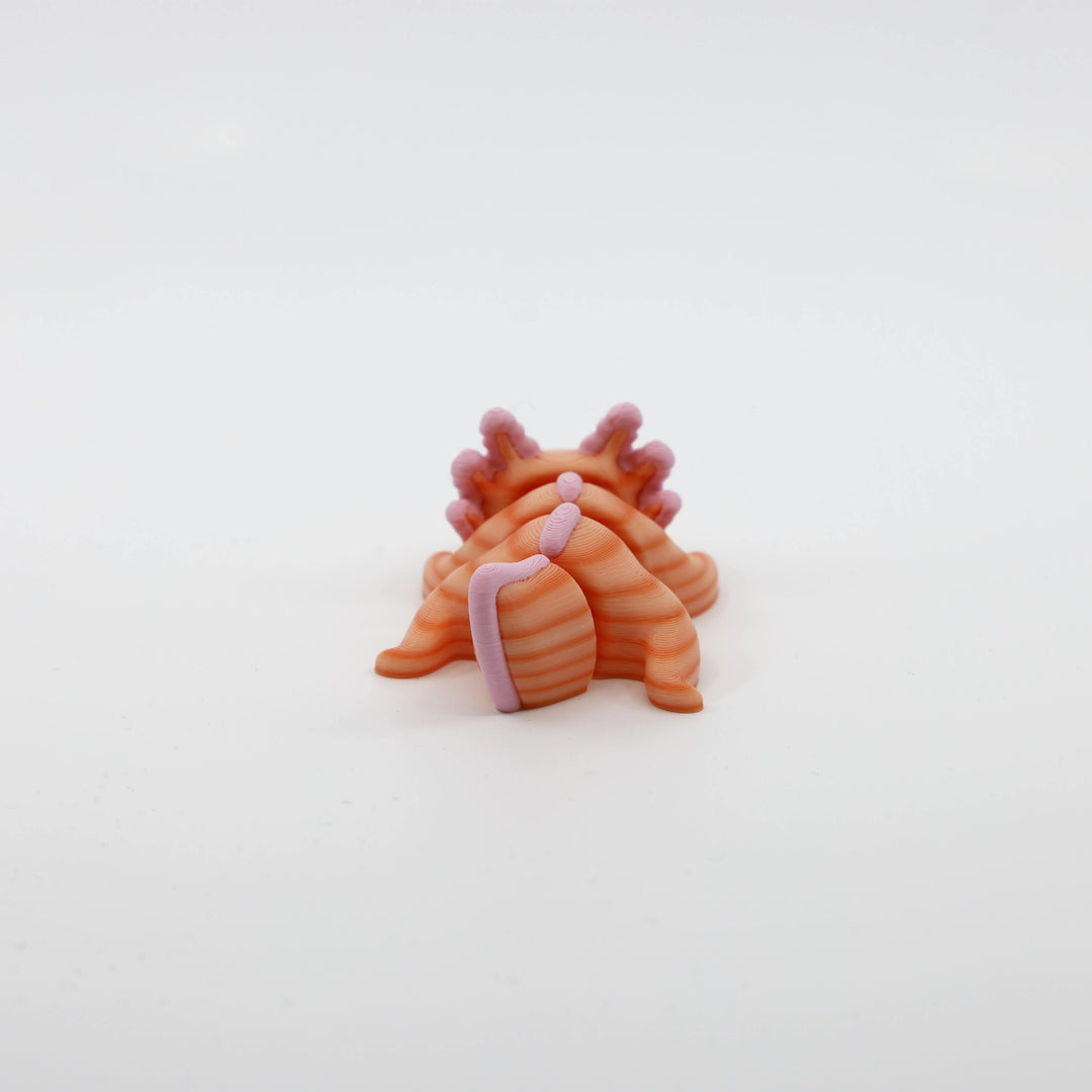 Back view of articulated Mini Axolotl Fidget designed for sensory play