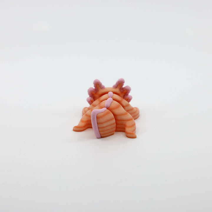 Back view of articulated Mini Axolotl Fidget designed for sensory play