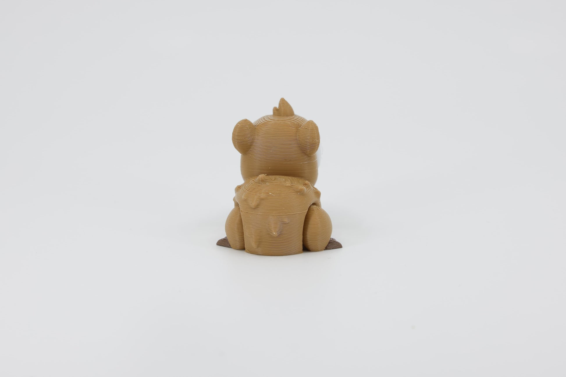 Back detail of the sensory 3D printed mini capybara, emphasizing the smooth texture and rounded rump designed for fidget play.