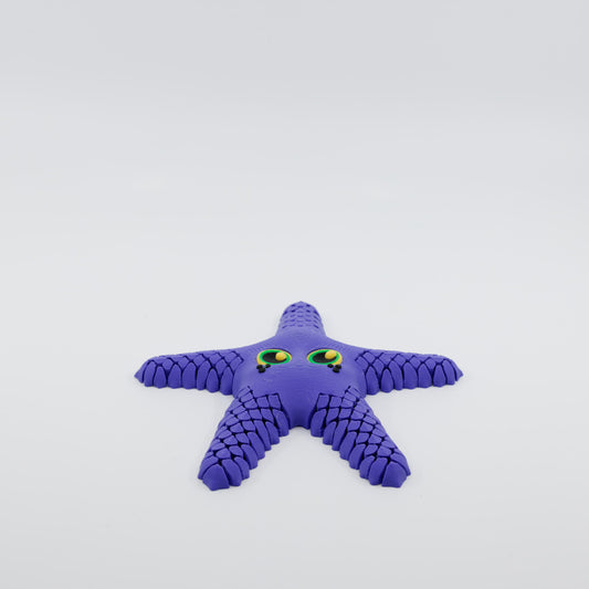 Front view of 3D printed flexi starfish fidget with articulated arms in purple