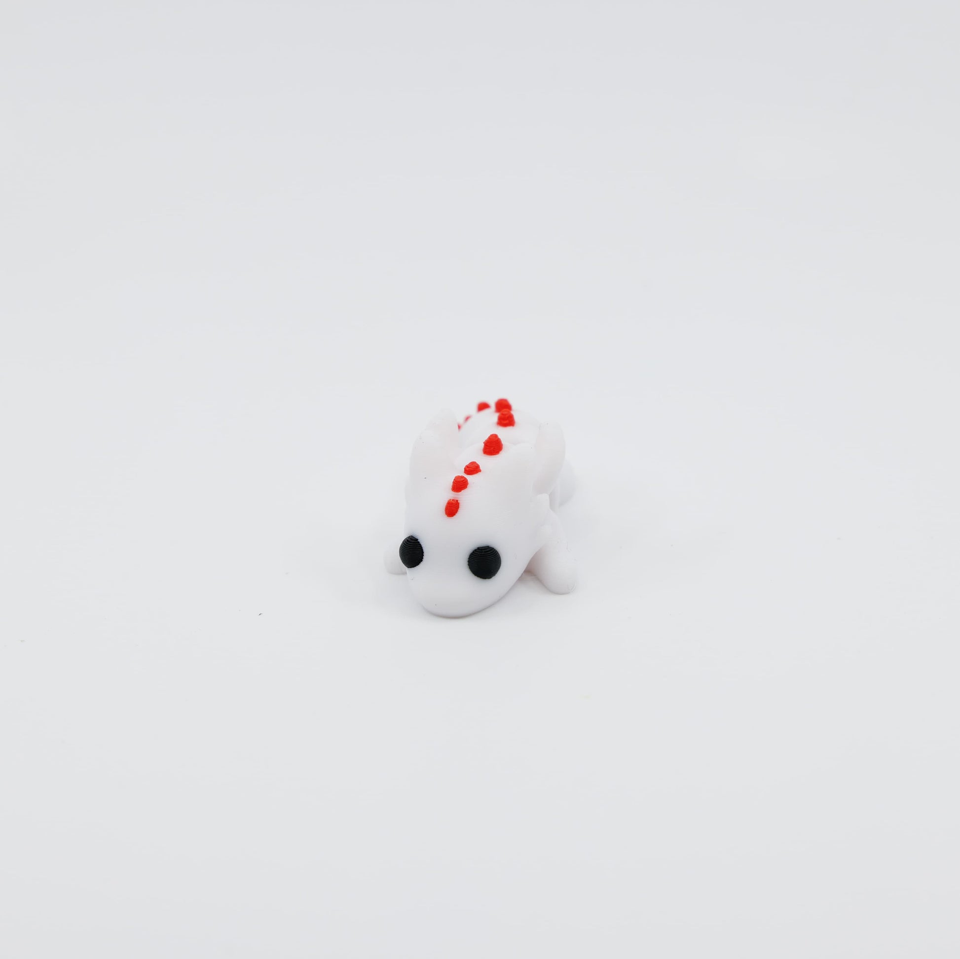 Front view of 3D printed mini dragon articulated fidget